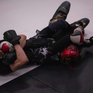 man in black and red boxing gloves